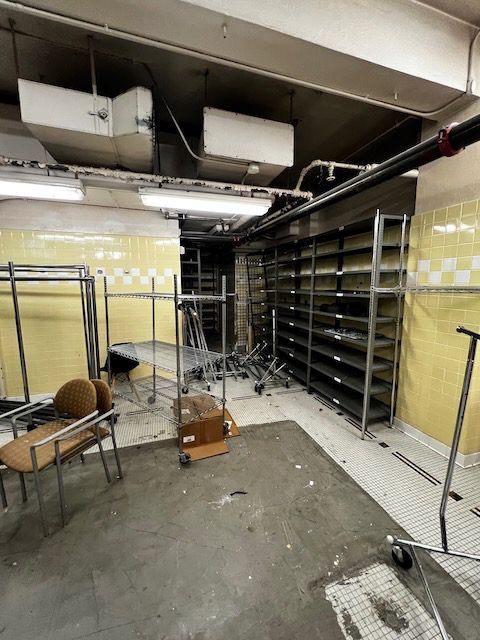 Junk B Gone crew removing items from YWCA basement