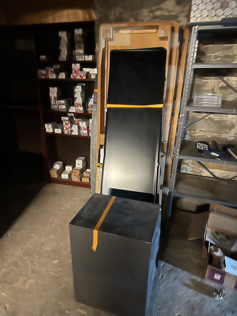 Old display cabinet and merchandise shelving ready for removal at Beneath the Streets