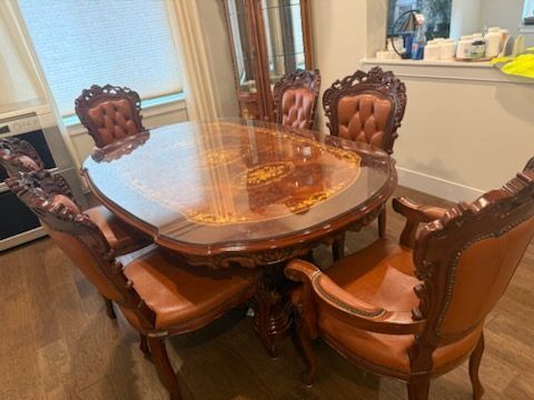 Carved dining table and chairs removed during a Lynnwood estate cleanout