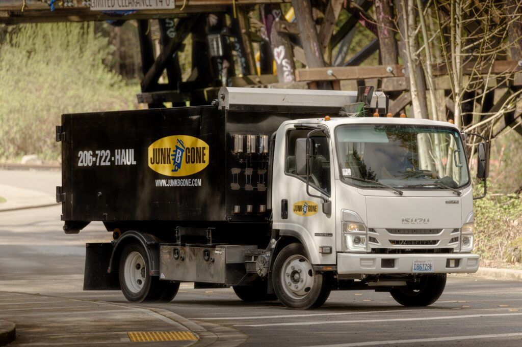 Junk B Gone truck under the Mercer Slough trestle bridge in Bellevue, WA — Bellevue junk removal