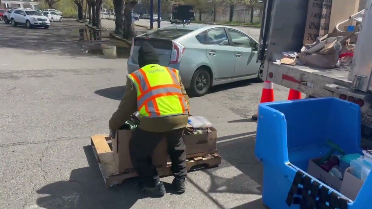 Junk B Gone crew donating items at Goodwill in Seattle