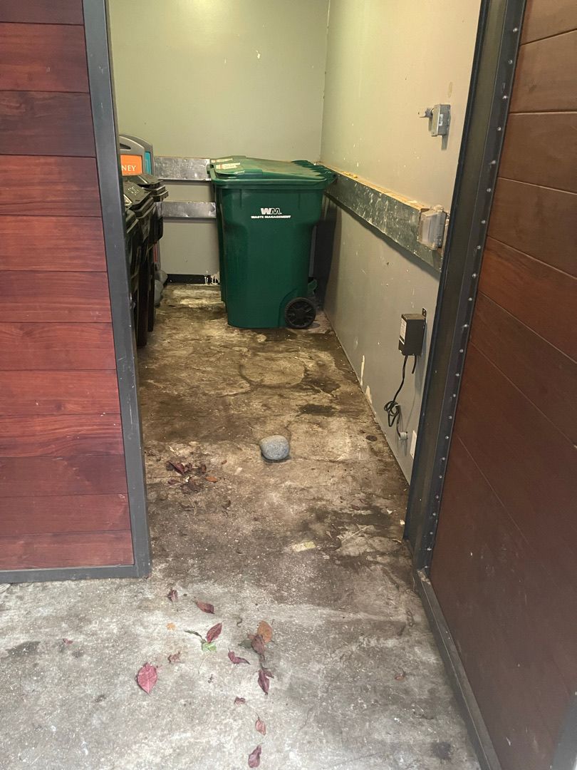 Empty storage room in a Seattle rental after a junk removal pickup