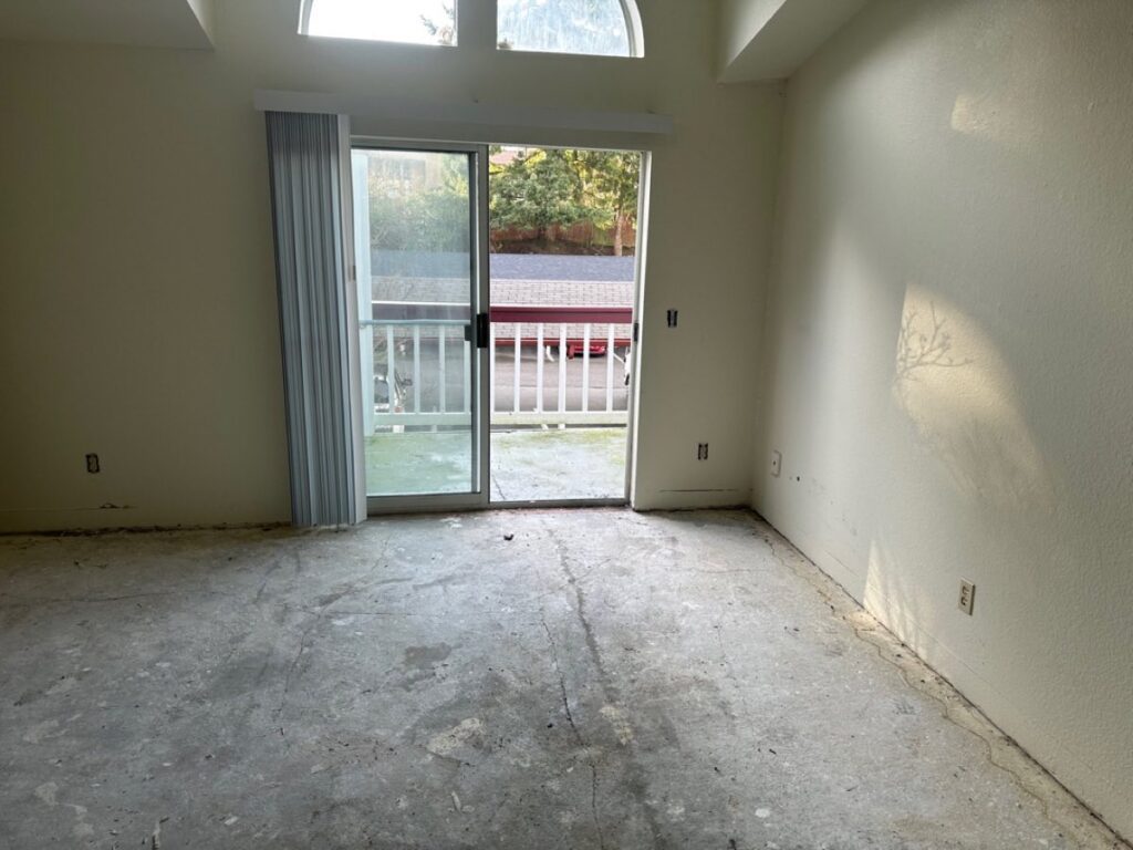 Clean empty room after apartment remodel cleanout