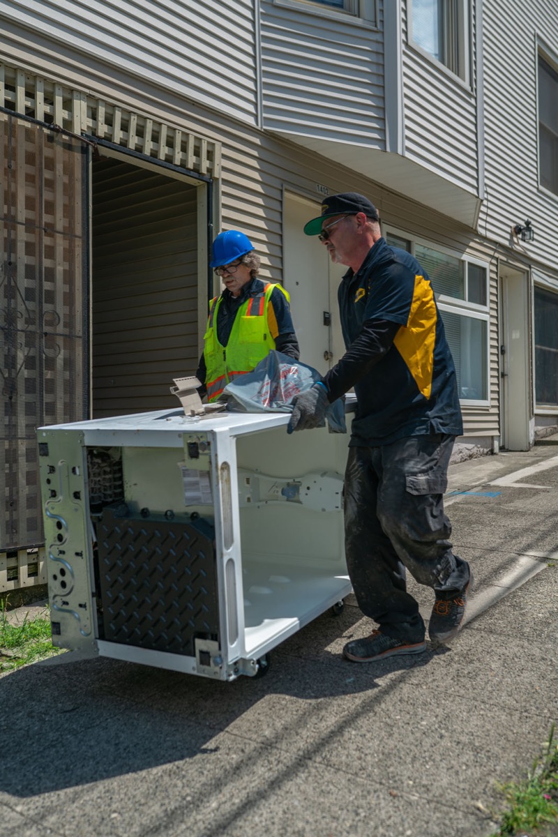 Junk B Gone crew loading furniture in Kirkland WA